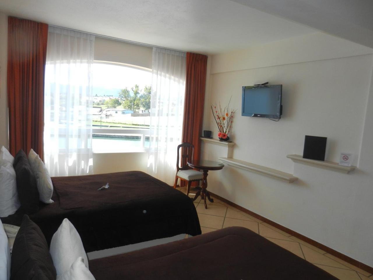 Hotel 9 Manantiales Чіґнауапан Екстер'єр фото