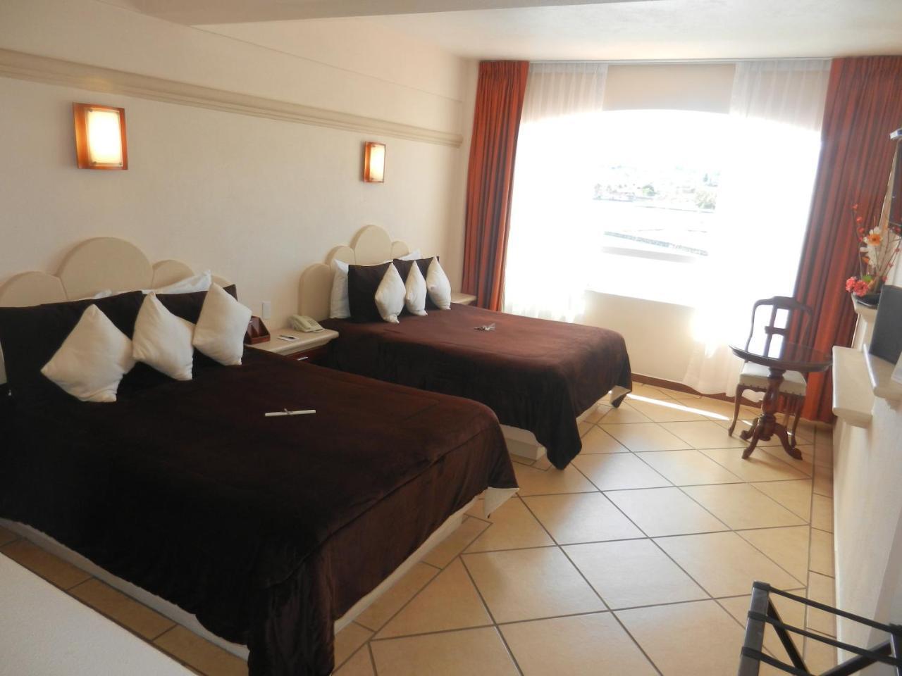 Hotel 9 Manantiales Чіґнауапан Екстер'єр фото